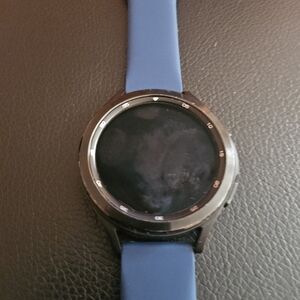 Samsung Smartwatch with Black Case and Blue Band